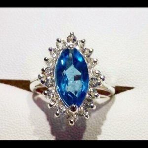 Blue sapphire ring with diamonds